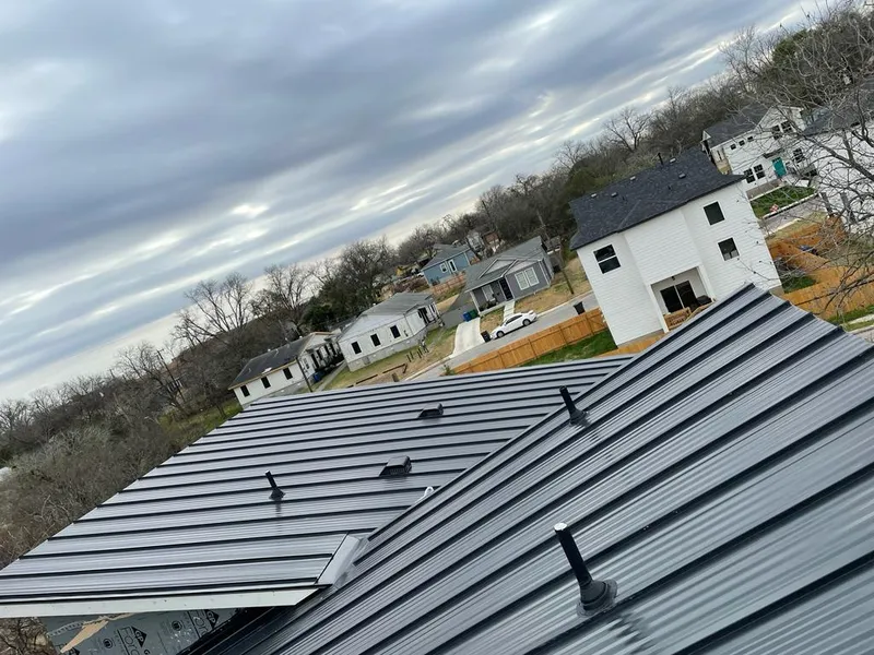 Standing seam metal roof panels with vents for Skylight Repair in Sheboygan Falls